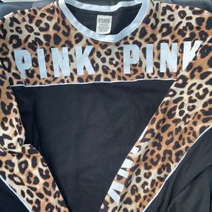 Long sleeve leopard print Pink shirt.